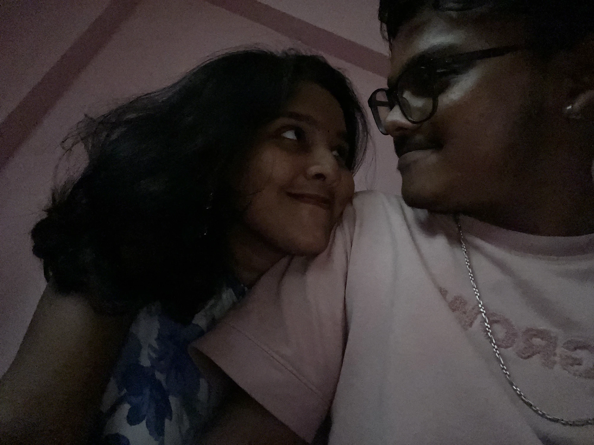 The two of us sharing a quiet smile indoors